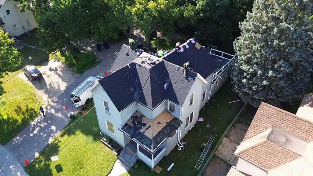 Roofing contractor, AFC Exteriors, installing roof in Dane County, Wisconsin