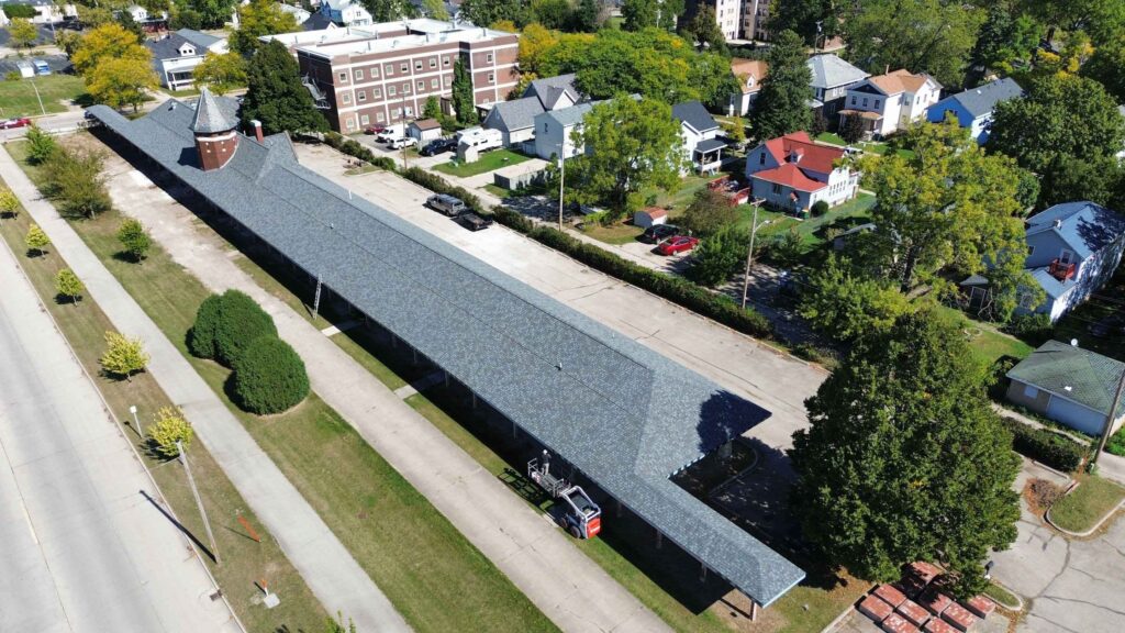 Train station roof installed by roofing contractors near me in Dane County, Wisconsin